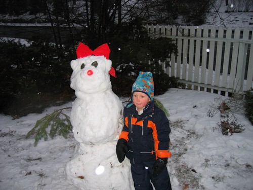 Snowman and Alex in the Front Yard